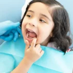 Why Your Child’s Tooth Turned Dark (and What It Means)