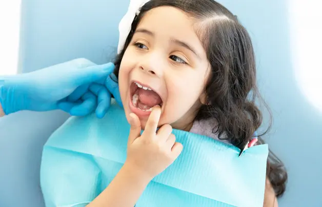Why Your Child’s Tooth Turned Dark (and What It Means)