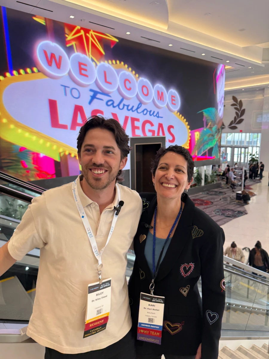 Dr Badwi and Dr Riley outside the office conference